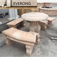 Table de jardin en marbre blanc avec banc
