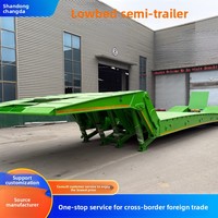 Fabricant de remorques fournit des semi-remorques à plateau bas et à col de cygne pour le transport d'équipements lourds et de machines dans le secteur minier du charbon en Chine