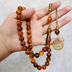 Charme muslimischen Mala Rosenkranz Armband Großhandel Islamische Geschenk Hadsch beten Gebets perlen Harz Bernstein 10mm 33 Gebets perlen Sibha