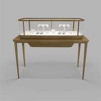 Hochwertige Luxus-Schmuckvitrine aus Edelstahl mit Verriegelung, Maßgefertigte Thekenvitrine mit LED-Beleuchtung, Moderne Glasvitrine, Umweltfreundlicher Einzelhandelsbedarf