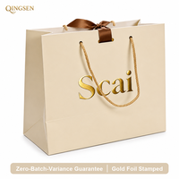Sac cadeau en papier paysage personnalisé OEM de luxe, avec poignée en corde de coton et nœud en satin estampé or ivoire, pour bijoux, vêtements et boutiques