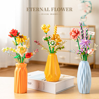 Vente en gros Vase à fleurs éternelles en plastique pour décoration bricolage Bloc de briques Jouet Bouquet de fleurs Ensemble de blocs de construction