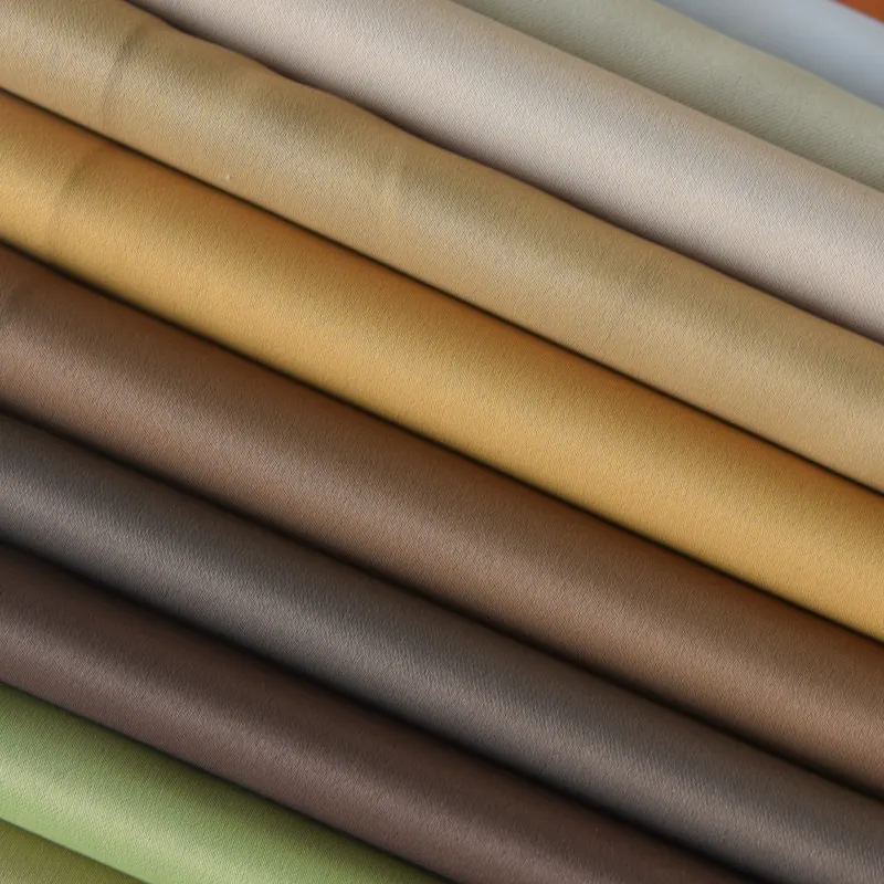 Bestselling Dimout blackout quality curtain fabric woven polyester plain inherent flame retardant fabric for curtains