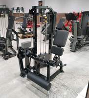 Appareil de musculation professionnel réglable à charge par pignon pour l'extension des jambes assis