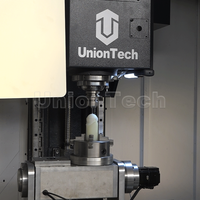 Machine de fraisage CNC verticale 5 axes de haute précision avec broche BT40, broche simple, changement d'outil automatique pour le métal
