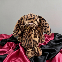 Peluche Lapin Léopard Style JC 30cm avec base lestée, en peluche courte haute densité, oreilles longues, apaisant, avec trois étiquettes et sac