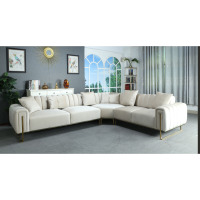 Canapé d'angle en L moderne de luxe en tissu velours écologique et durable, rembourré, avec piètement en acier inoxydable pour salon - Vente en gros usine