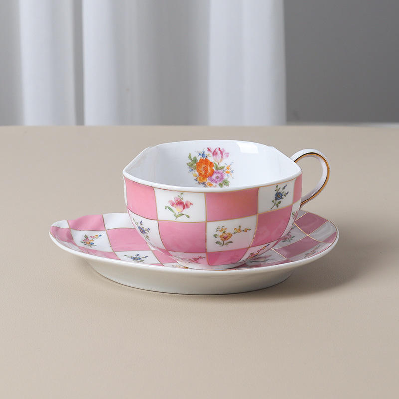 A pink cup and a plate