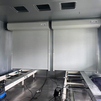 Porte à enroulement automatique en aluminium pour entrepôt industriel, garage et magasin de détail avec rideau robuste et accès rapide