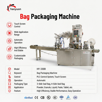 Machine d'emballage professionnelle à performance stable avec contrôle PLC pour l'emballage de bonbons, biscuits, pain et autres produits alimentaires en sachets de type oreiller