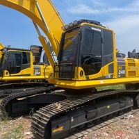 Excavadora de cadenas usada KOMATSU PC240LC con línea de martillos auxiliares completa y bajo mantenimiento para tareas de rompe roca ligera y limpieza de terrenos
