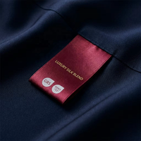 Étiquettes tissées personnalisées en coton biologique certifié OEKO-TEX Standard 100 pour vêtements, pliage central