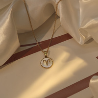 Collier pendentif chaîne sportive en acier inoxydable plaqué or 18 carats avec signes du zodiaque en coquillage blanc MW Twelve