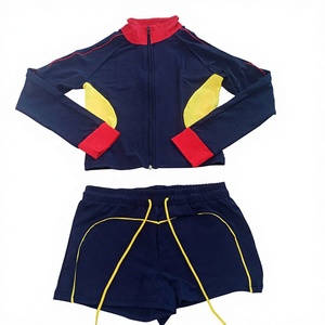 Set Loungewear da <span class=keywords><strong>Donna</strong></span> in Tessuto Traspirante con Top Corto Ricamato e Pantaloncini a Pieghe Svasati - Product Image 6
