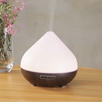 Diffuseur d'arômes en bois grainé 550 ml, humidificateur volcanique, distributeur de parfum coloré, machine à parfum télécommandée - Buse