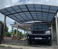 Cochera Doble de Policarbonato con Estructura de Aluminio, Impermeable y Duradera, Solución para Estacionamiento y Almacenamiento al Aire Libre