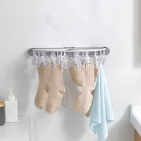 2025 vente chaude ménage mural pliant sous-vêtements à linge soutien-gorge chaussettes séchage cintre pliable cintre avec 24 Clips