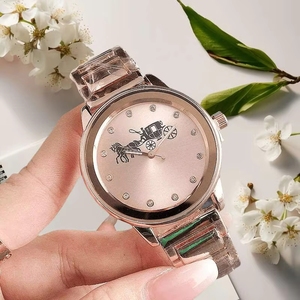 Montre de luxe pour femmes en or rose avec cadran en forme de calèche, marqueurs en strass, élégante montre-bracelet à quartz pour femmes - Product Image 1