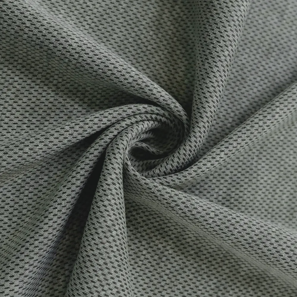 ผ้าตาข่ายโพลีเอสเตอร์สำหรับเสื้อบาสเก็ตบอลผ้าแห้งพอดีตัวทำจากผ้าฝ้าย40% โพลีเอสเตอร์60/40