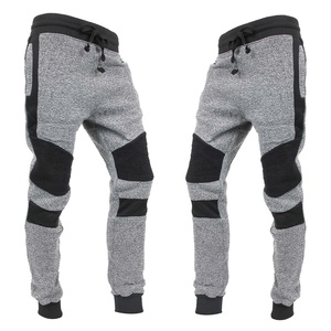 Pantalon de survêtement en molleton gris pour homme, coupe ajustée, taille élastique, avec empiècements noirs et poches, pour toutes les saisons - Product Image 1