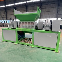 Déchiqueteuse à double arbre en plastique durable, machine de déchiquetage robuste pour le recyclage des déchets plastiques
