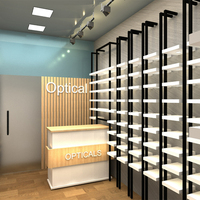 Conception de décoration intérieure de magasin de lunettes de soleil optiques modernes, présentoirs sur pied multi-niveaux en bois personnalisés avec éclairage LED et comptoir de réception
