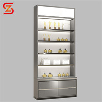 Présentoir à parfums personnalisé pour magasin, présentoir de luxe en verre, vitrine design pour parfums
