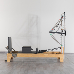 เครื่องพิลาทิสอเนกประสงค์ที่ทนทาน พร้อมเตียงเลื่อนและเตียงแกนกลางสีขาวแบบกึ่งยกสูง  พร้อมอุปกรณ์ทาวเวอร์รีฟอร์เมอร์ไม้ - Product Image 1