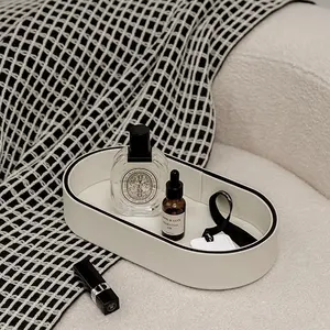 Baki Valet kulit Oval, desain ukiran klasik pengatur ruang tamu untuk perhiasan kunci kacamata parfum dan jam tangan