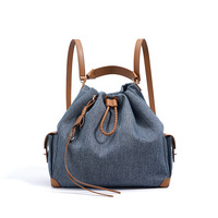 Tas Ransel Wanita Anti Maling Kulit Asli Normcore/Minimalis untuk Komuter Kasual Kapasitas Besar Ringan dengan Tali Serut
