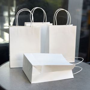 500 ชิ้นเป็นมิตรกับสิ่งแวดล้อมถุงกระดาษคราฟท์ทนทานพร้อมที่จับ 4.3x7.8x10.6 นิ้วถุงของขวัญสำหรับช้อปปิ้งร้านกาแฟซื้อกลับบ้าน - Product Image 1