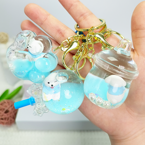 พวงกุญแจอะคริลิคทรงต่างๆ น้ำหนักเบา พิมพ์ลาย UV ทรายเหลวสีฟ้า ประดับกลิตเตอร์รูปสุนัขสุดน่ารัก ของตกแต่งรูปสัตว์การ์ตูน - Product Image 3