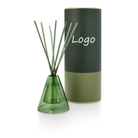 Diffuseur de parfum de luxe en gros, nouveau diffuseur d'ambiance avec bouteille décorative en verre artistique et bâtonnets en rotin OEM