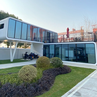 Vente en gros usine : Villa préfabriquée en acier léger au design moderne et luxueux, capsule spatiale avec système intelligent et conteneur