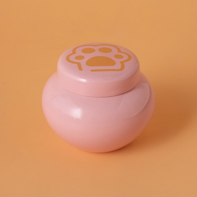 Round ash urn-pink-golden paw print