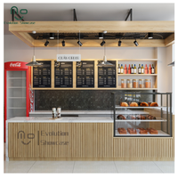 Kiosque de café mobile moderne et modulaire avec comptoir de paiement et éclairage LED, mobilier écologique, table et chaises