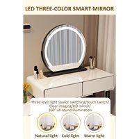 Coiffeuse compacte blanche avec plateau en verre trempé, armoire latérale interchangeable et miroir intelligent LED 3 couleurs pour petits espaces.