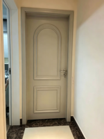 Portes d'entrée cintrées écologiques en bois massif laqué, couleur crème clair, style français européen pour chambre à coucher