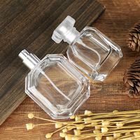 Flacon de parfum en verre transparent de luxe, personnalisé, populaire, carré, épais, avec pulvérisateur, 100 ml, vente en gros