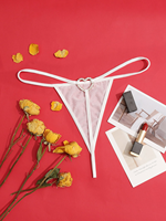 Pantalon chaud en forme de coeur extrêmement attrayant mince femmes Lingerie creux Triangle pantalon Sexy maille Transparent G String