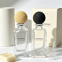 Flacons de parfum transparents personnalisables de luxe 85 ml, très demandés, disponibles avec bouchons et boîtes d'emballage