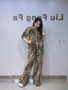 European and American women's fashion: <b>leopard</b> <b>print</b> patchwork, rhinestone-embellished, stand-up collar, long-sleeved casual set - Product Image 1