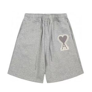 Nuevos pantalones deportivos de marca a la moda para el verano, pantalones cortos holgados y versátiles con bordado para hombre y mujer, pantalones cortos AMI para parejas - Product Image 2