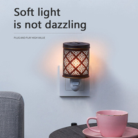 Lampe d'aromathérapie à l'huile essentielle pure en gros American Electric Plug-in Metal Melting Wax Burner Iron Art Wax Lamp