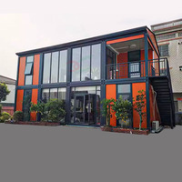 Maison préfabriquée en conteneur à structure en acier pour bureau de luxe à double étage petite villa