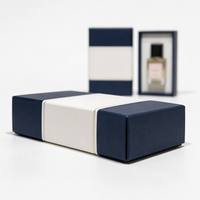 Boîte cadeau magnétique de luxe en carton recyclable en forme de livre personnalisée pour flacon de parfum en verre avec estampage