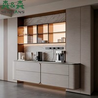 Buffet minimaliste avec station à café intégrée, quatre tiroirs arrondis, crédence en marbre et dessus en verre