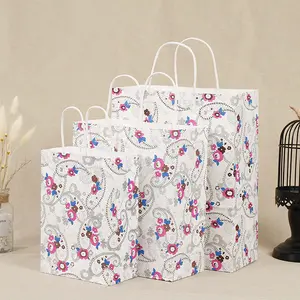 12 adet paketi tatil sezon parti hediye lehine davranır çanta Goodie hediye sarma Kraft kahverengi çiçek baskılı kağıt torba noel için