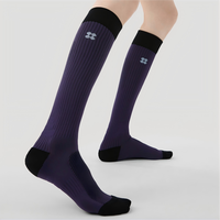 Chaussettes de course à compression pour femmes avec logo personnalisé, chaussettes de saut à la corde, chaussettes de basketball doublées en tissu éponge, chaussettes de soutien musculaire, chaussettes de sport pour les mollets