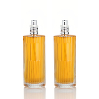 Bouteille en verre de parfum de haute qualité à rayures verticales de grande capacité de 150ml avec pulvérisateur en aluminium